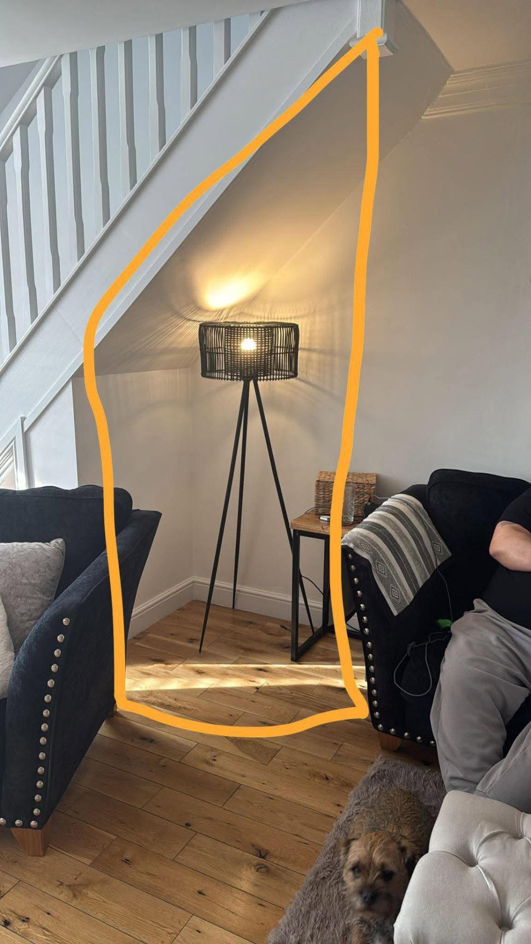 Before — wasted under-stairs corner