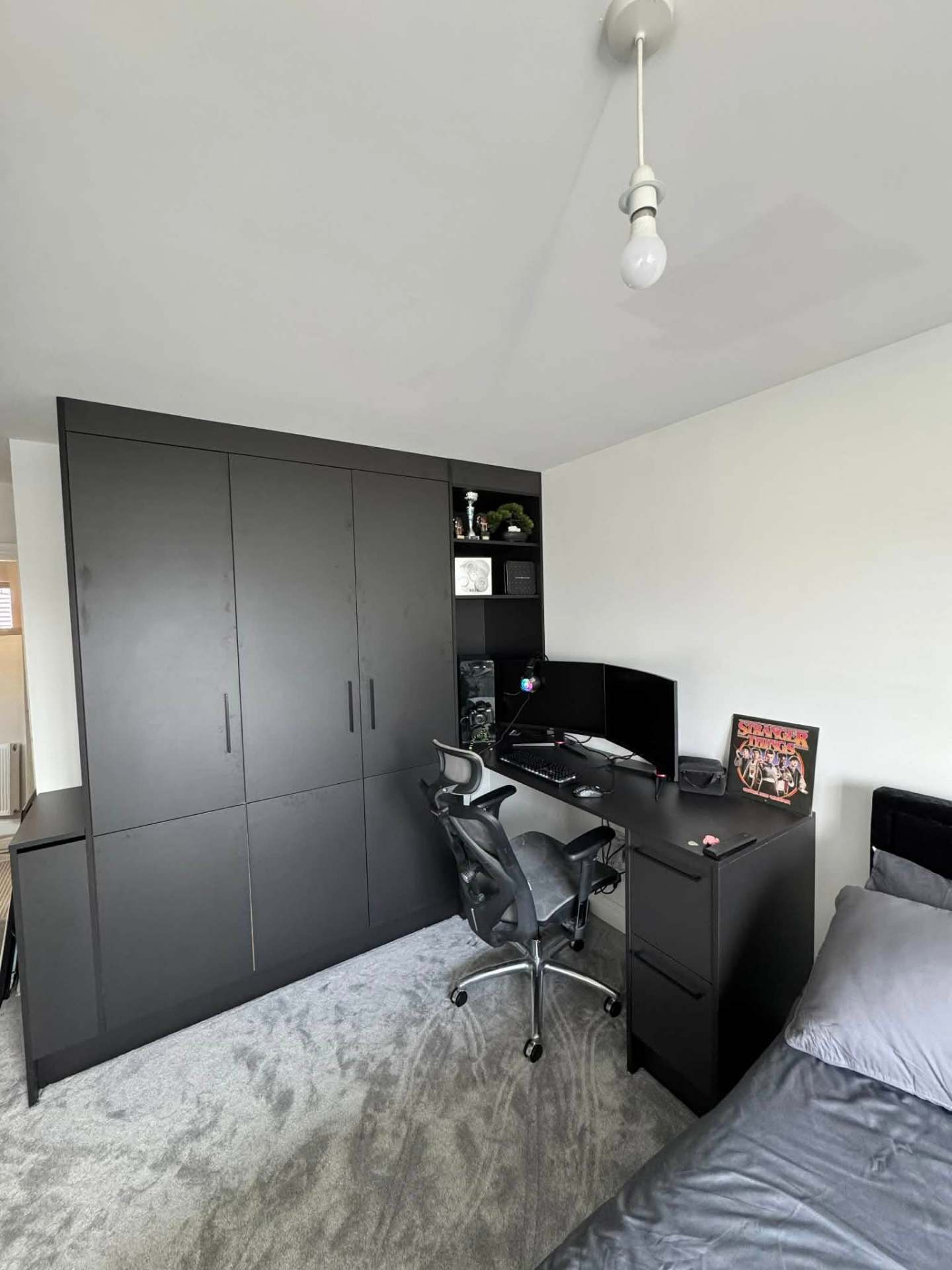 Charcoal floor-to-ceiling wardrobes with bedside drawers & display nook