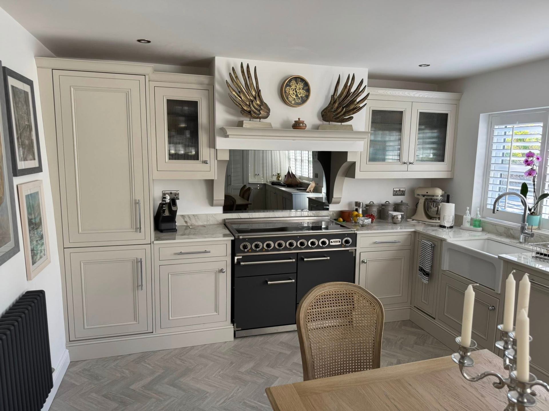 Classic cream in-frame kitchen with marble worktops & range cooker